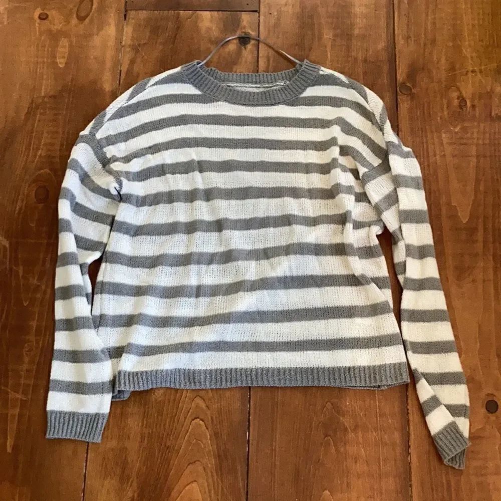 Gray and white sweater